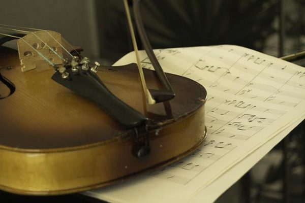 Solfeggio Frequencies Stradivarius violin on sheet music